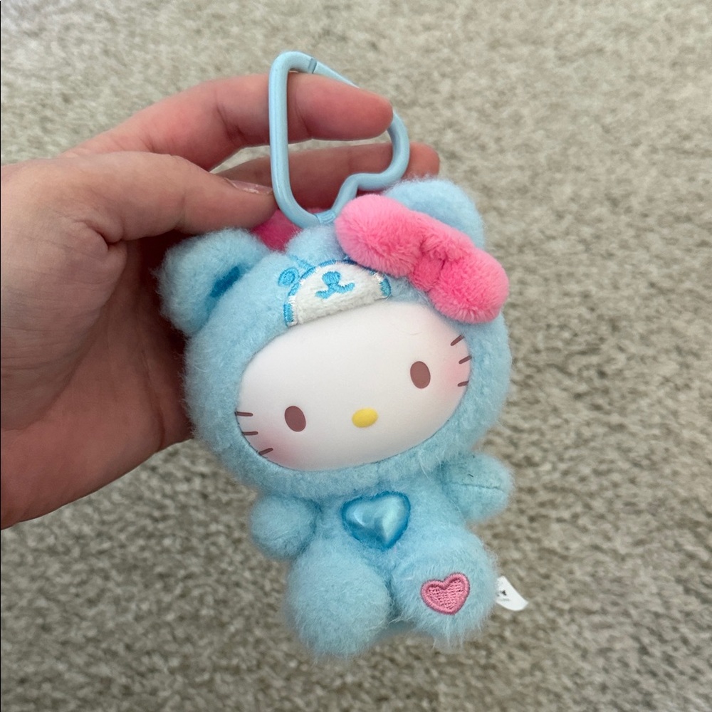 Sanrio Hello Kitty Plush Keychain in Light Blue Bear Costume with Pink Bow